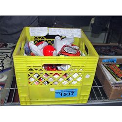 Yellow milk crate filled with pokeman collectables