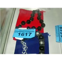 2 costume jeweled necklaces