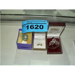 2 costume jeweled rings and a necklace