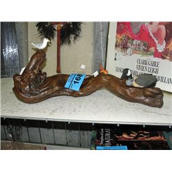 Hand crafted decorative animal figurine on wood