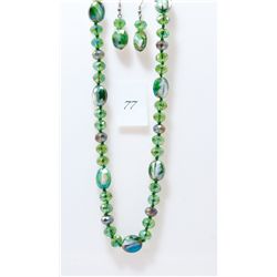 Costume jeweled necklace and earring set