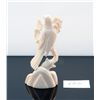 Genuine ivory carved bird figurine