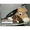 Image 1 : shelf lot of misc; small vacuum, large teddy bear