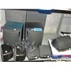 Shelf lot of assorted home audio speakers