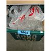 Image 1 : Green plastic laundry tub filled with assorted