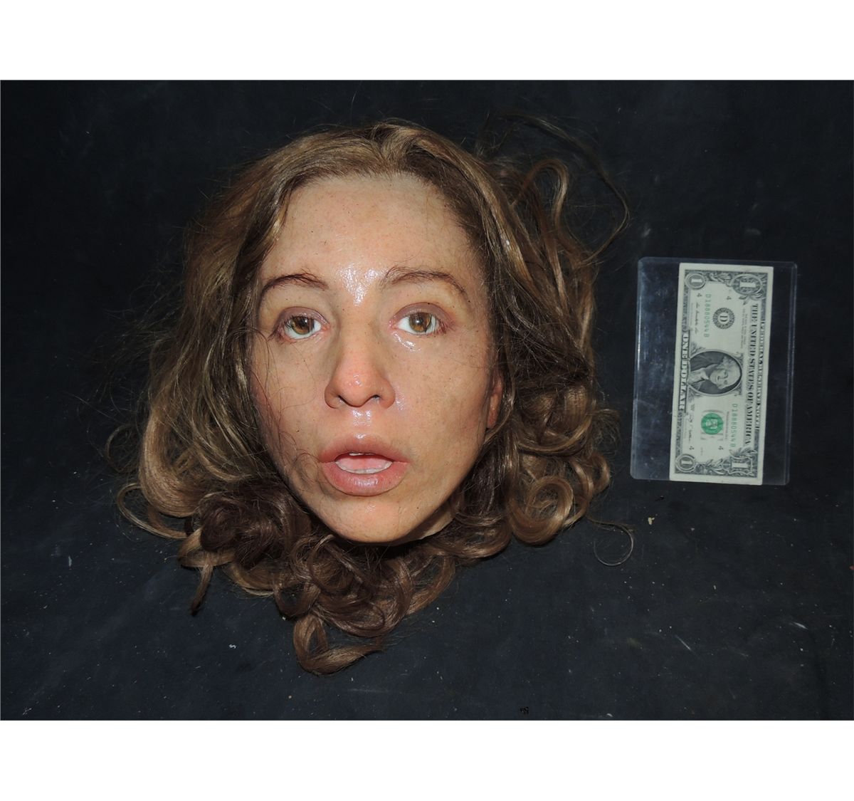 SILICONE FEMALE SEVERED HEAD WITH ACRYLIC EYES AND TEETH