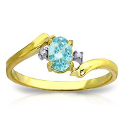 14K YG 0.01ct DIAMONDS & 0.45ct OVAL BLUE TOPAZ RING