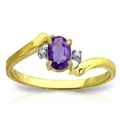 14K Y. GOLD DIAMOND & 0.45ct OVAL AMETHYST RING