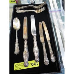 12 pieces of silver plate flatware