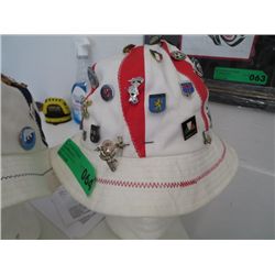 Hat covered in collector pins