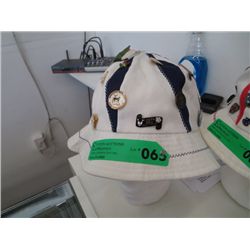 Hat covered in collector pins