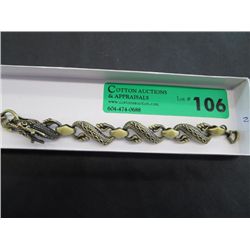 Dragon-shape bracelet, bronze tones