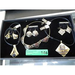 Three sets of necklaces and earrings