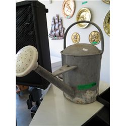 Old watering can