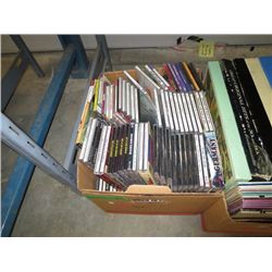 Box of CDs and DVDs