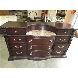 Ornate wood side board with marble insert