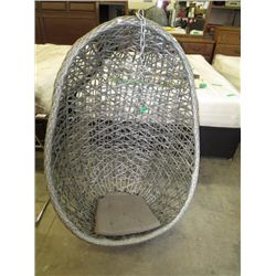 Hanging basket seat made of woven pewter coloured vinyl