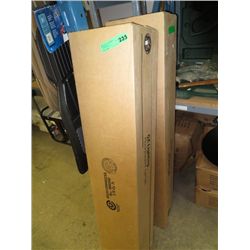 Two boxes of fluorescent light bulbs