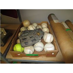 Tray of various balls and mitt