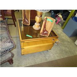 Rolling smoked glass coffee table with drawer