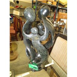 Carved family circle statue 15" tall