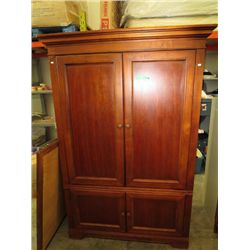 Entertainment cabinet with sliding TV tray