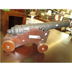 Decorative rolling wooden cannon replica