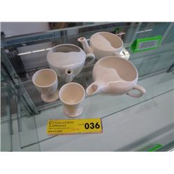 3 antique vitrified nursing cups and 2 egg cups