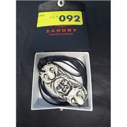 Carved bone Pendant on cord