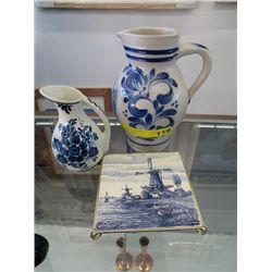 Three pieces of glazed cream and blue pottery