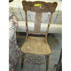 Antique carved back oak chair