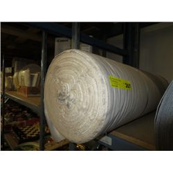 Roll of beige fabric
