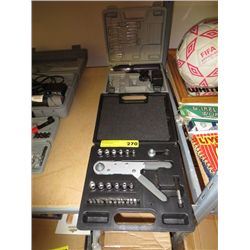 Dremel and mechanic's ratchet set
