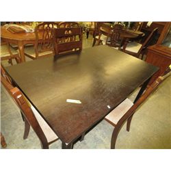 Wooden table with three chairs