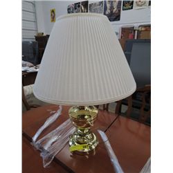 Brass coloured table lamp