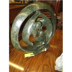 Carved family circle statue 16" tall