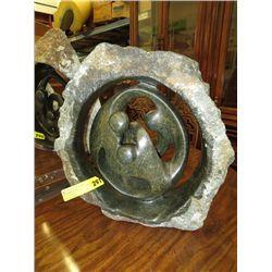 Carved soapstone family circle statue 18" tall