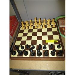 Chess set with storage in the board