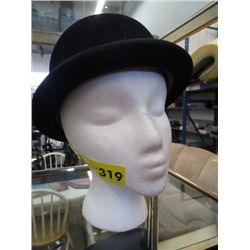 A bowler style riding helmet
