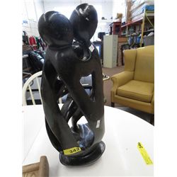 Carved family circle statue 19" tall