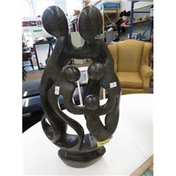 Carved family circle statue 19" tall