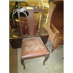 Antique chair with leather seat