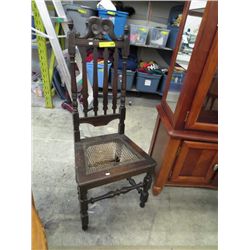 Antique chair with wicker seat