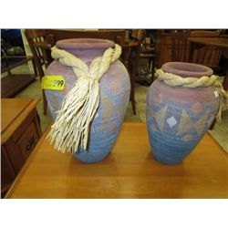 Two decorative clay pots