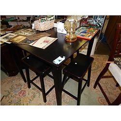 BLACK TABLE WITH 4 SADDLE STOOLS - 1 WIGGLES