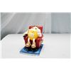 Image 1 : M&ms Yellow Figure Sitting In Chair