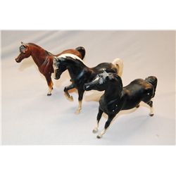 Three Breyer Horses