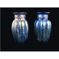 Pair of art glass blue Loetz vases.