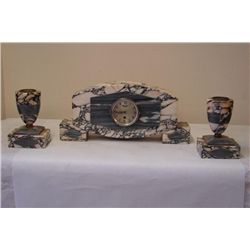 Art Deco Clock and matching pair of Garnitures