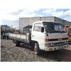 Image 1 : 1990 Isuzu Elf NPR58 Flat deck Truck "XC3351"